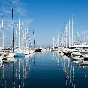 Harbor with yachts and sailboats in Saint Tropez, France.