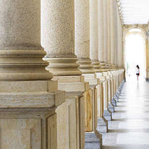 Row of classical columns, Mlynska colonnade Karlovy Vary Czech Republic established 1881, full frame horizontal composition, background with copy space